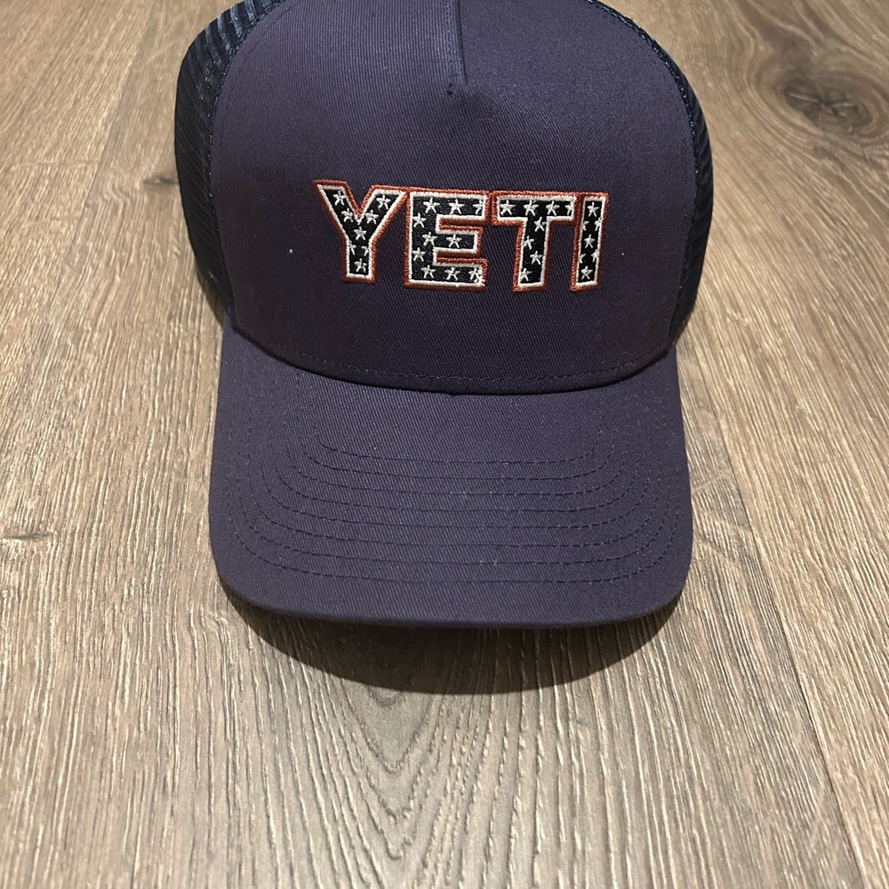 YETI Logo Patch Navy Blue Trucker Hat Onesize with Stars